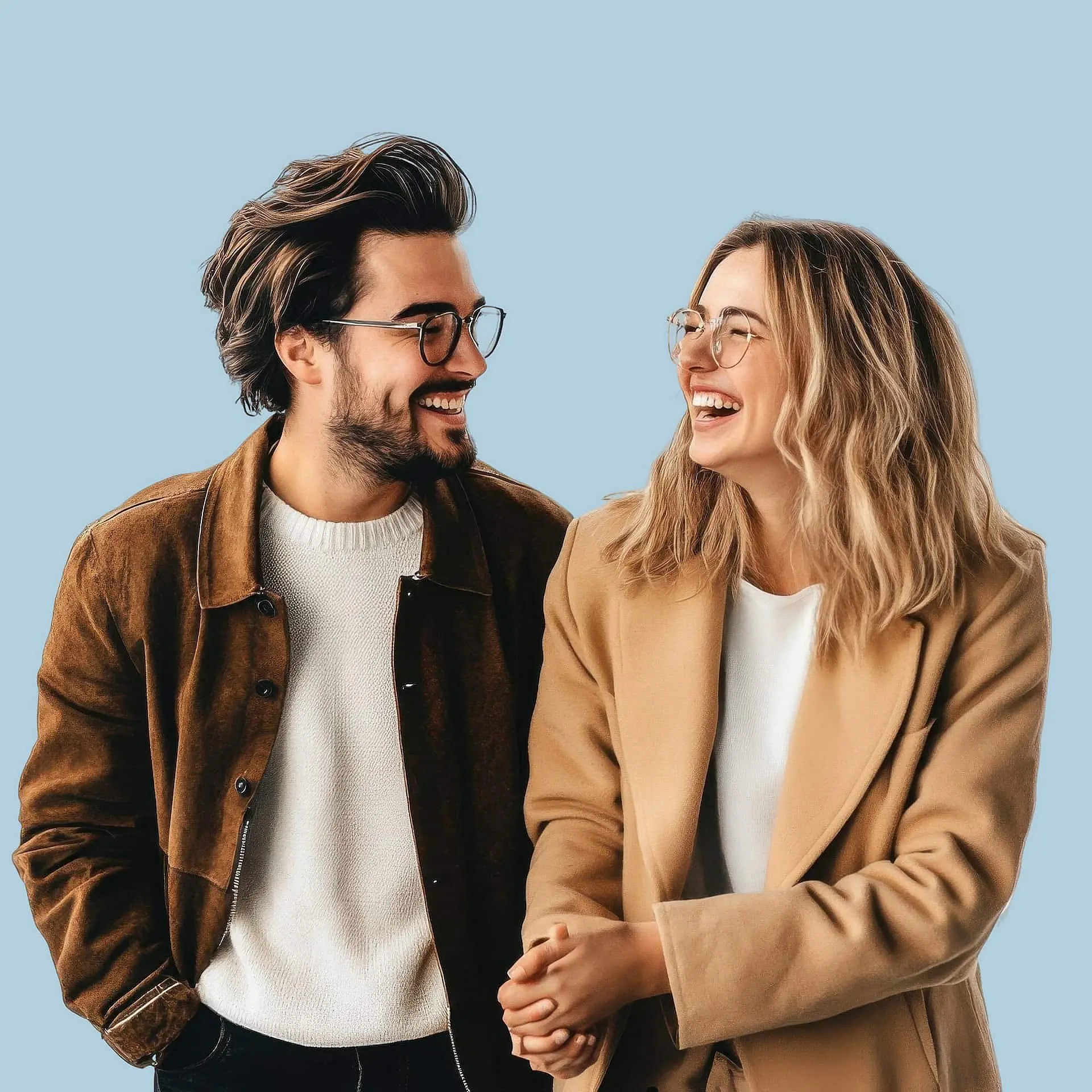 Two people with braces and glasses, dressed in casual jackets, smile at each other against a light blue background, representing Levine Orthodontics in Cape Coral, FL.