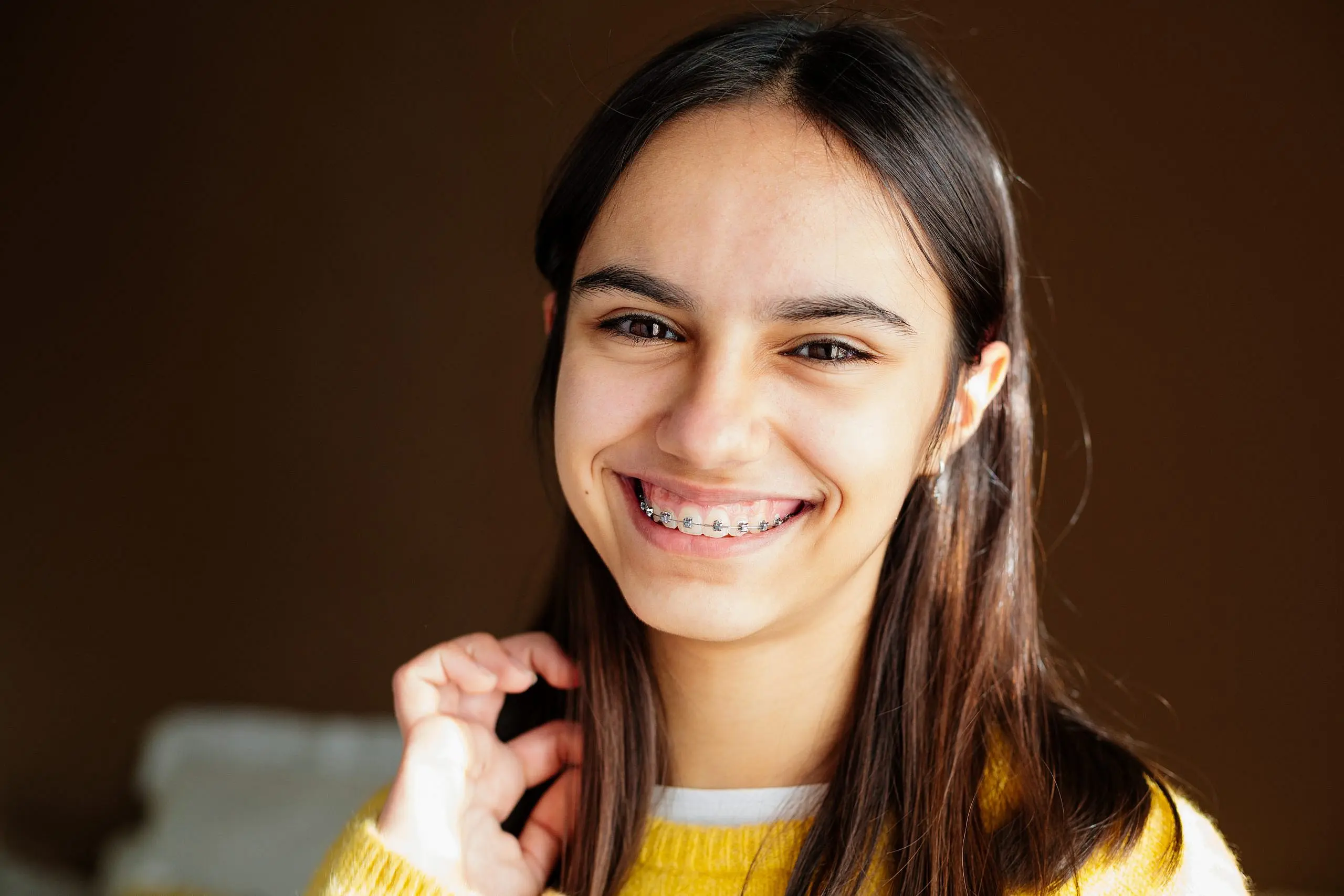 A girl with metal braces in Fort Myers FL