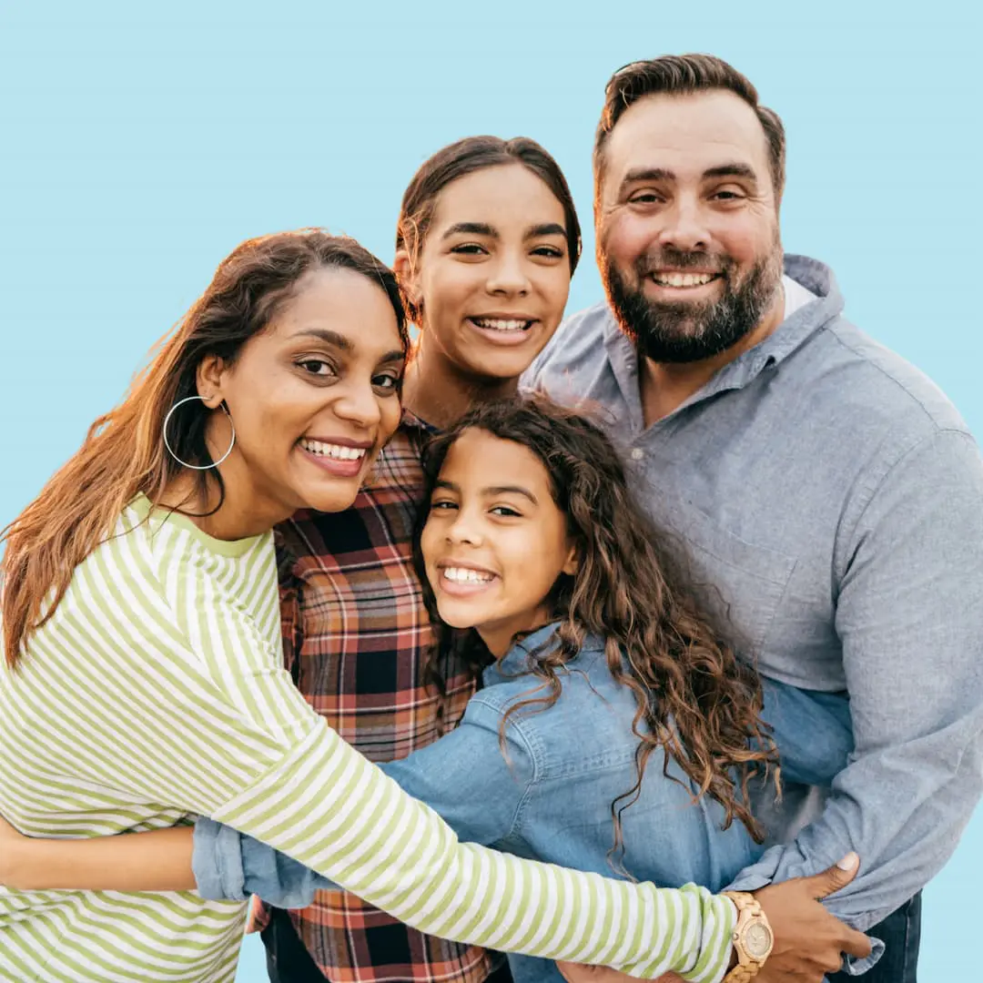 Parents with their children learning about orthodontic insurance coverage and treatment options at Levine Orthodontics in Fort Myers, Cape Coral, and Lehigh Acres, FL. Understanding how age limits on certain dental plans may affect braces and Invisalign coverage with help from the orthodontic team.