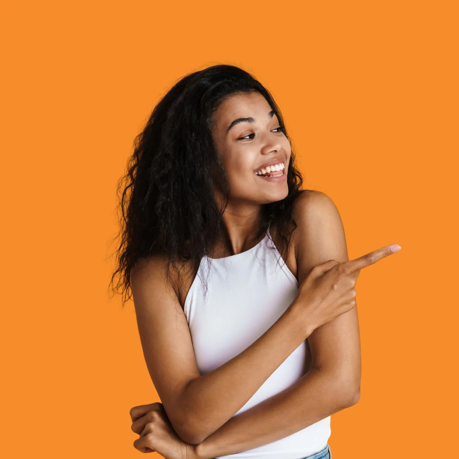 Smiling woman pointing proudly, representing patients who choose Levine Orthodontics in Fort Myers, Cape Coral, and Lehigh Acres, FL for affordable, high-quality orthodontic care.